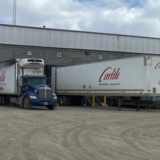 Carlile trucks for LTL shipping parked at a loading dock